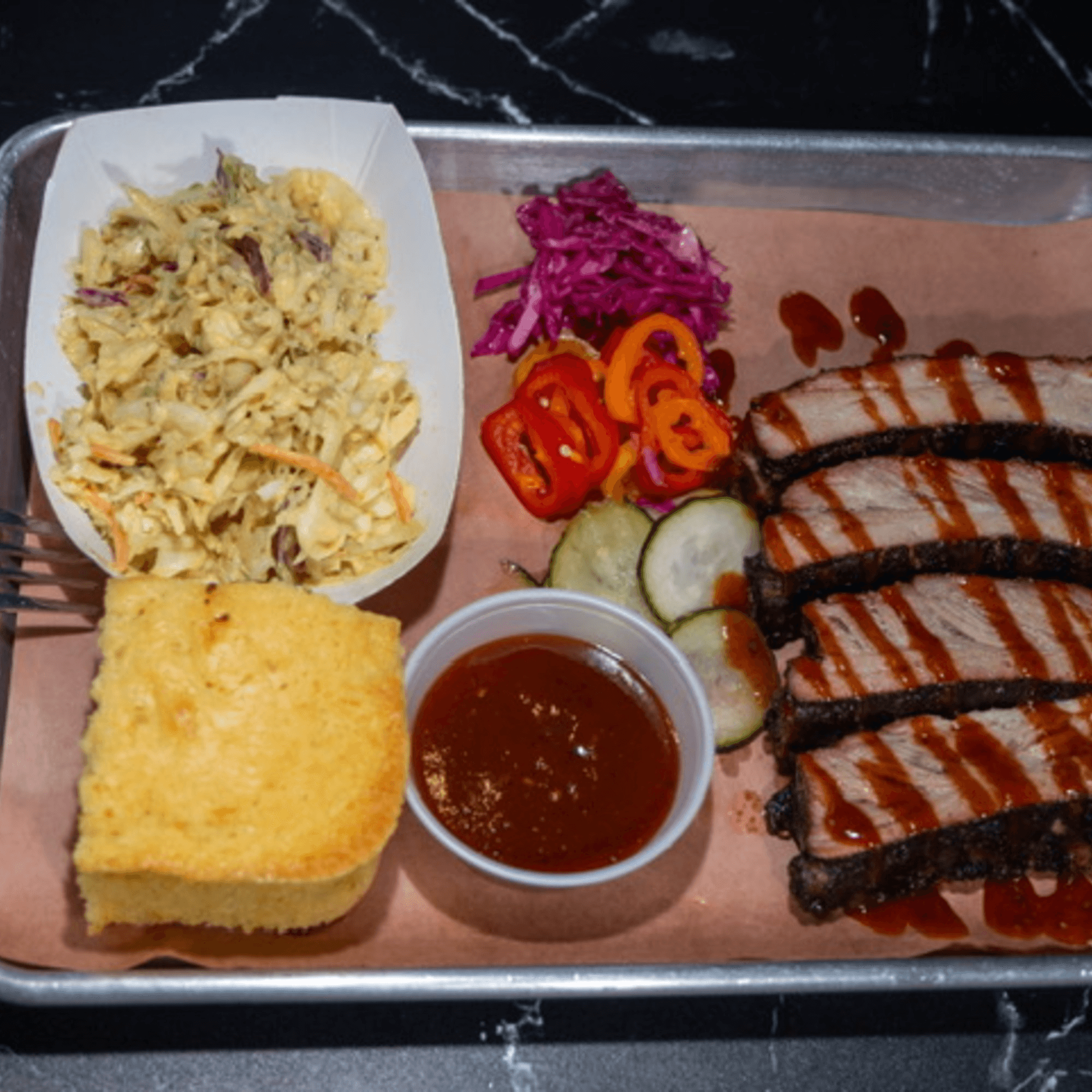 Oink and Moo BBQ food truck at a catered event in NJ